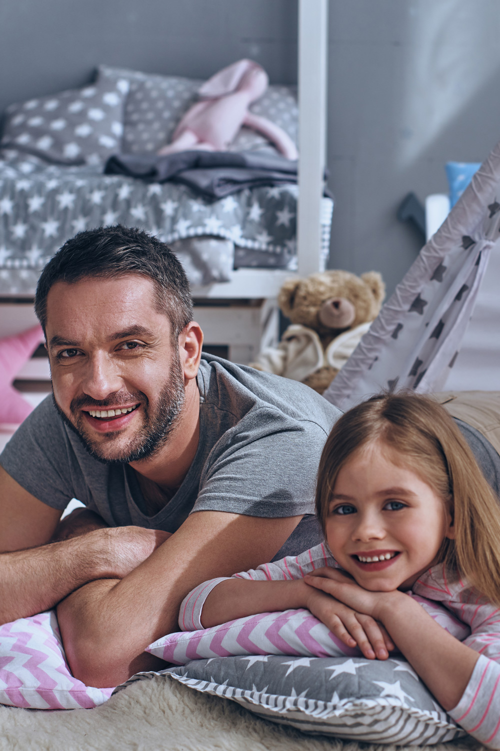 Father with daughter in their new family home