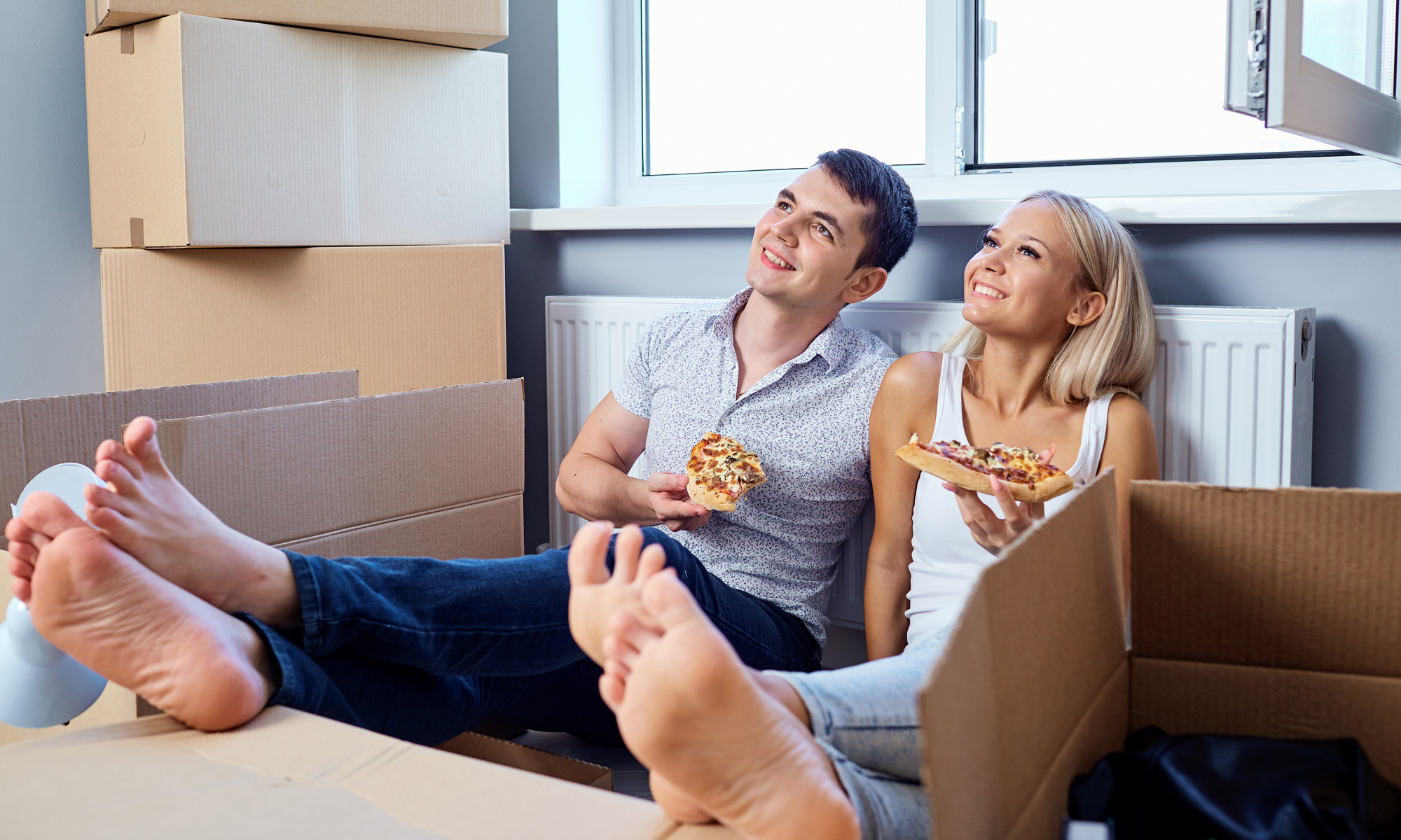Couple sitting in their new home