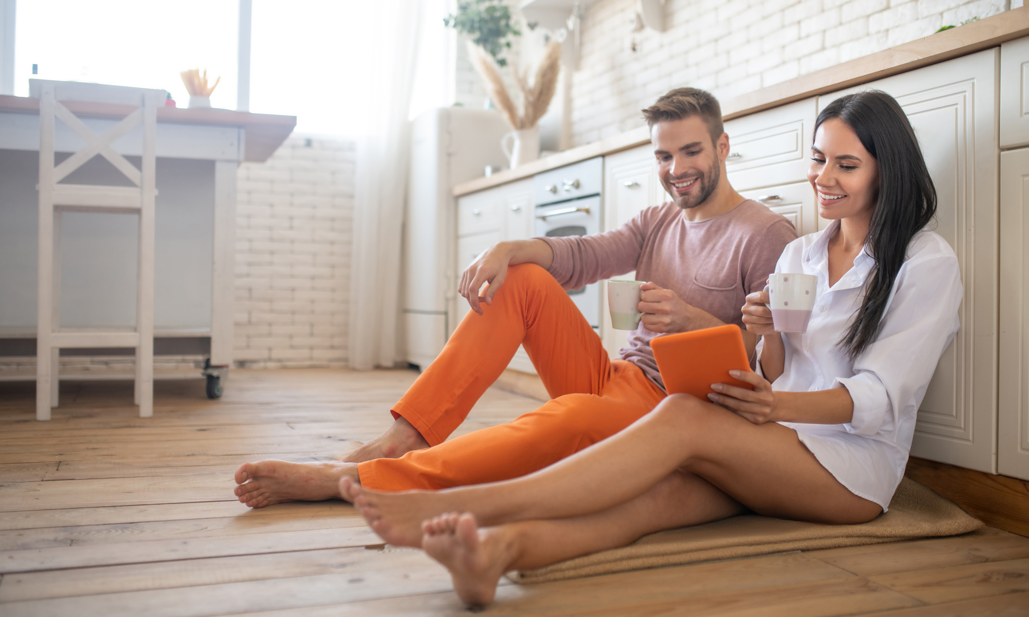 Couple looking at a tablet computer